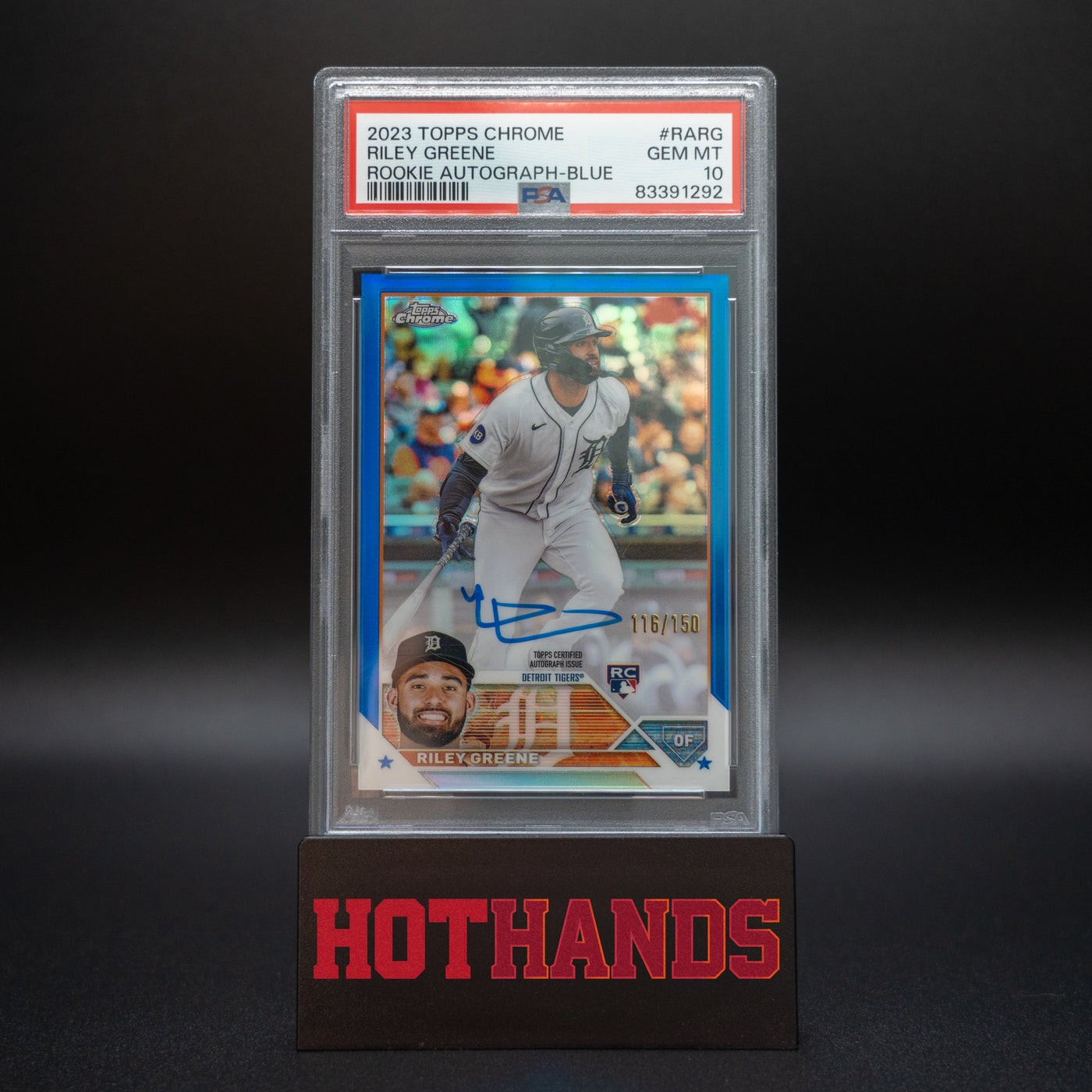 2023 Topps Chrome Riley Greene Blue Rookie Autograph card, graded PSA 10, numbered 116/150, displayed on a Hot Hands stand.